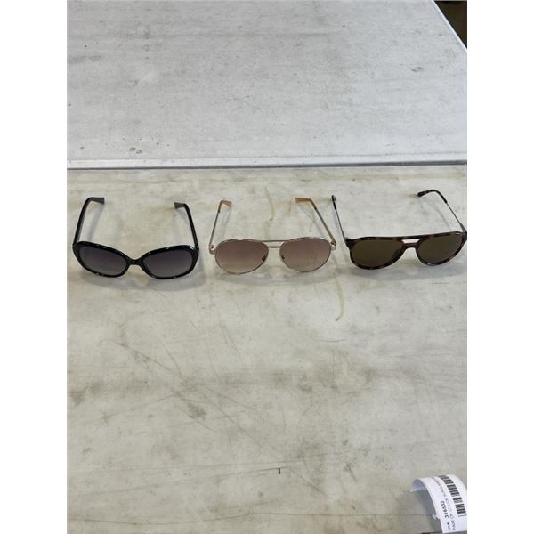 2 CALVIN KLEIN AND 1 GUESS PAIRS OF SUNGLASSES.