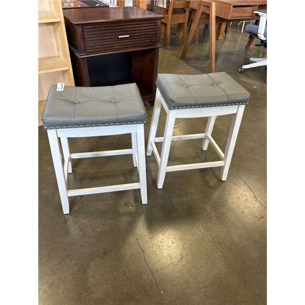 2 SADDLE BAR STOOLS WITH GRAY CUSHIONED SEATS