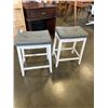 Image 1 : 2 SADDLE BAR STOOLS WITH GRAY CUSHIONED SEATS
