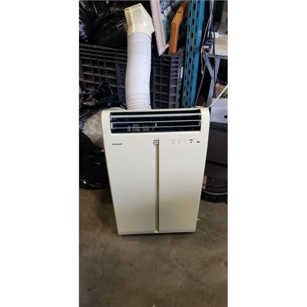 SHARP AIR CONDITIONER WITH REMOTE. MODEL CV-P10MX. WORKING