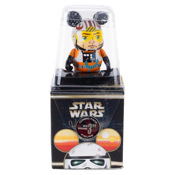 A Vinylmation Lukle Skywalker X-Wing Pilot Figurine.