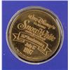Image 5 : A "Snow White and the Seven Dwarfs" 50th Anniversary Ticket and Coin.