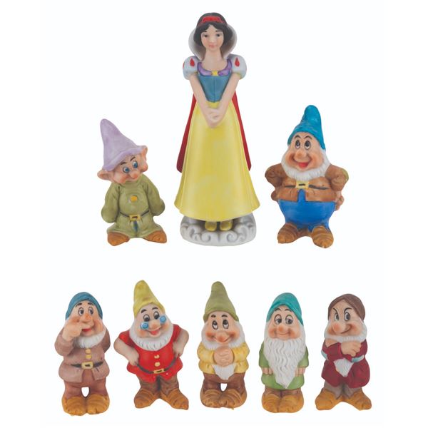 A Set of "Snow White and the Seven Dwarfs" Figurines.