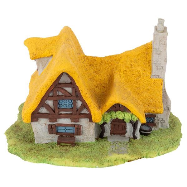 A "Snow White" Cottage Figurine.