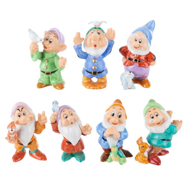 A "Snow White and the Seven Dwarfs" Ceramic Figure Set.