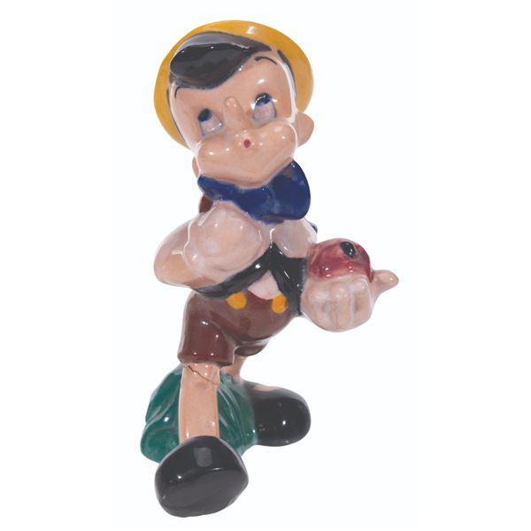 A Pinocchio Figurine by Brayton Laguna.