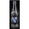 Image 1 : A Donald Duck Cola Bottle.