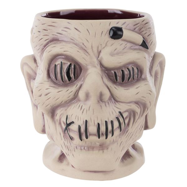 A Trader Sam's Enchanted Tiki Bar 4th Edition Shrunken Head Mug.