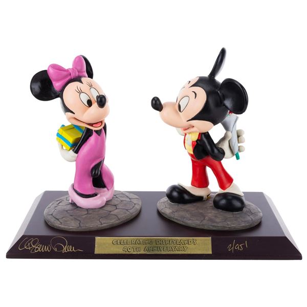 A Mickey and Minnie Mouse Limited Edition Figurine Set.
