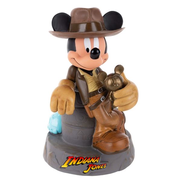 A Mickey Mouse as Indiana Jones Bank.