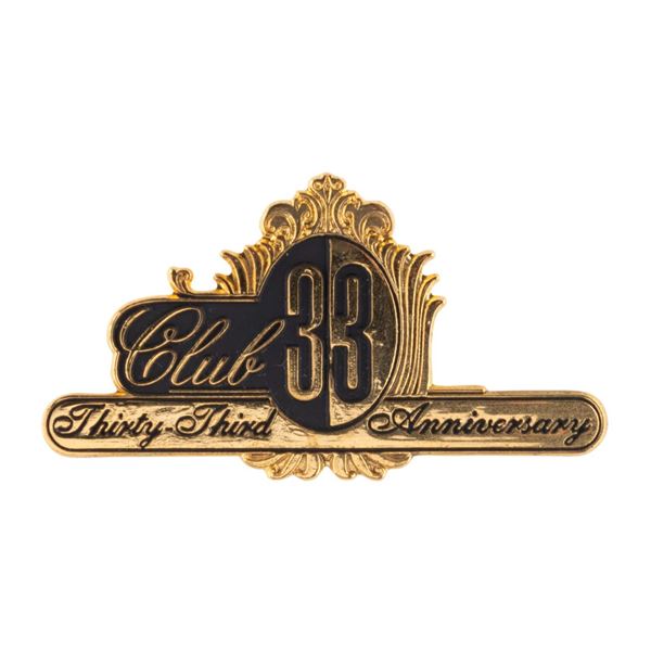 A Club 33 Thirty-Third Anniversary Lapel Pin.