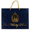 Image 1 : A Large Patterned Club 33 Shopping Bag.