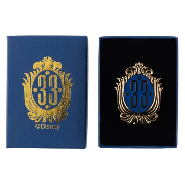 A Club 33 Logo Pin.