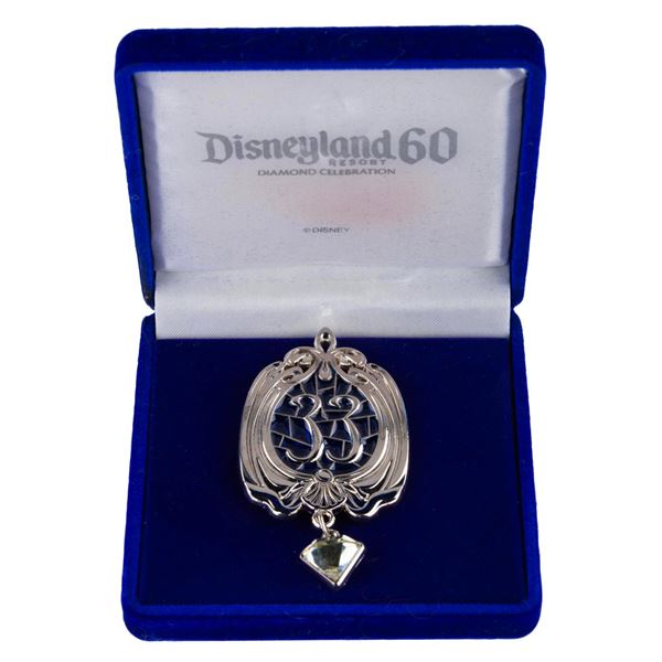 A Club 33 Disneyland Diamond Celebration Pin.