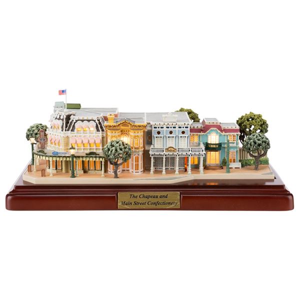 A First Edition Olszewski Disney World Chapeau and Main Street Confectionery.