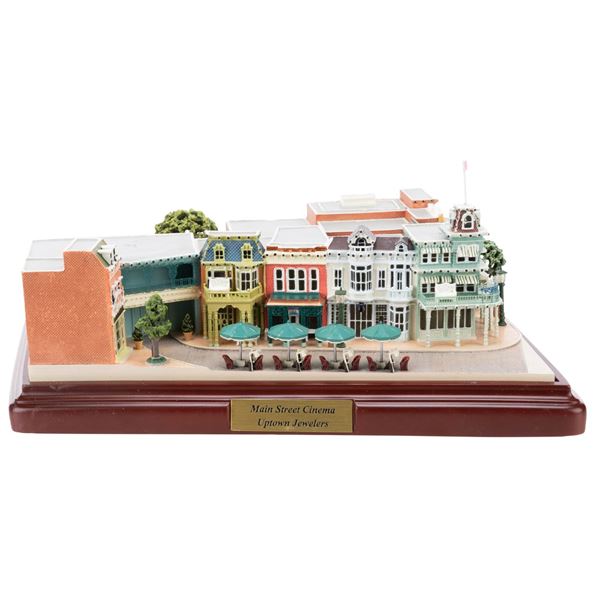 A First Edition Olszewski Walt Disney World Main Street Cinema and Uptown Jewelers.