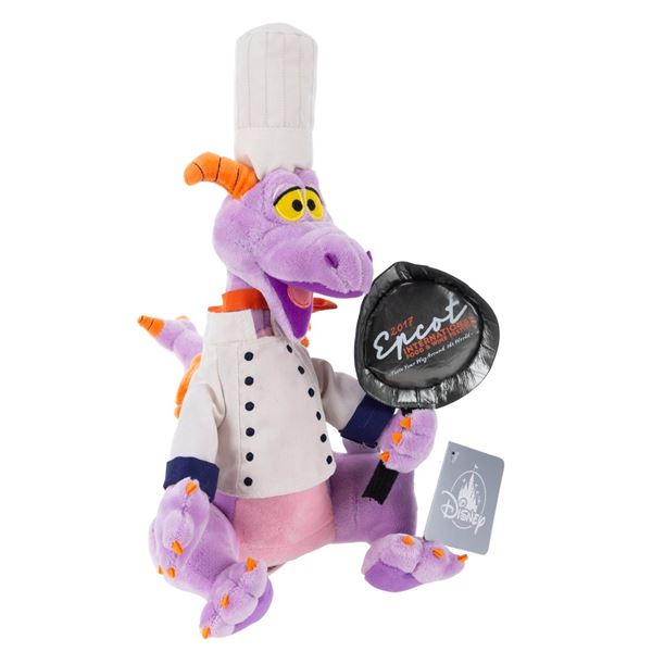 An Epcot Food & Wine Festival Figment Plush.