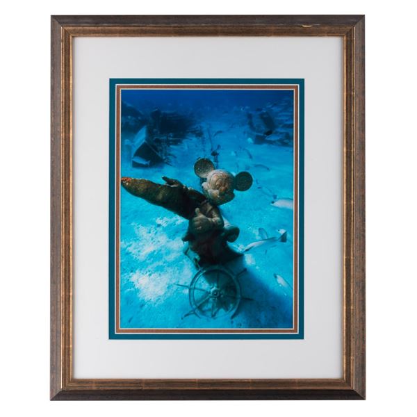 A Framed Castaway Cay Mickey Mouse Statue Print.