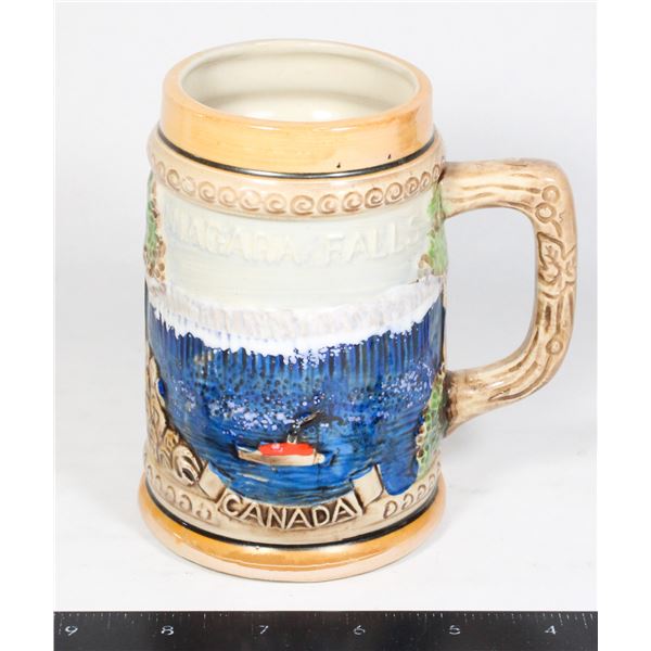 1950'S GERMAN STYLE RELIEF STEIN OF RCMP