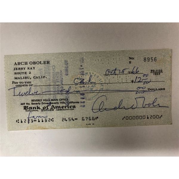 House on Fire first edition and personal check