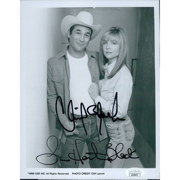 Country Superstars Clint and Lisa Hartman Black signed photo. JSA Authenticated