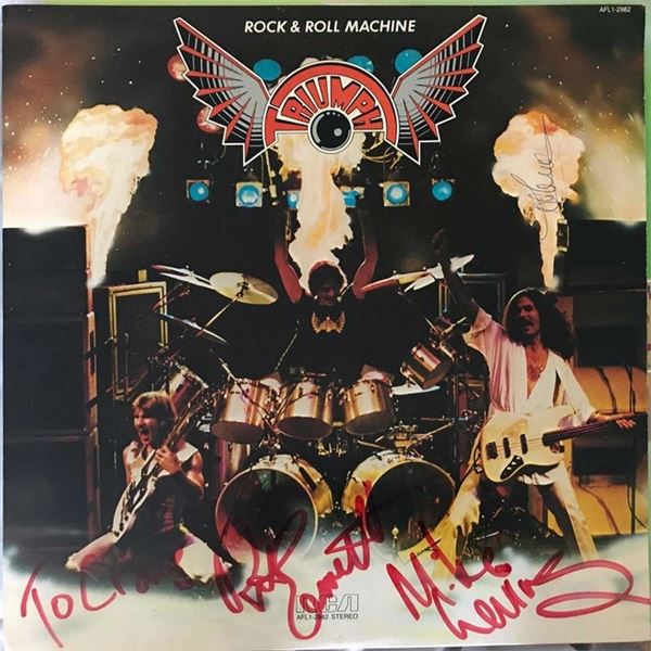 Triumph Rock & Roll Machine band signed album