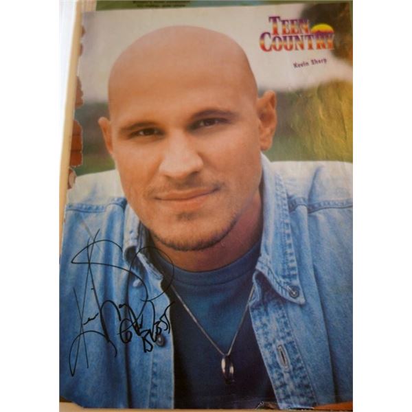 Kevin Sharp signed magazine photo