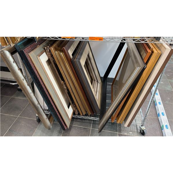 Group Of Assorted Empty Picture Frames In Various Sizes