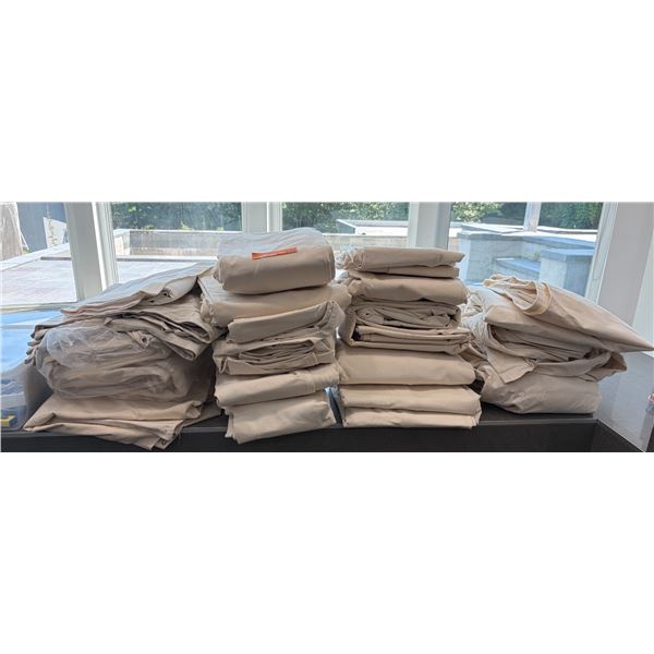 Group Of Folded Canvas Drop Cloths And Covers