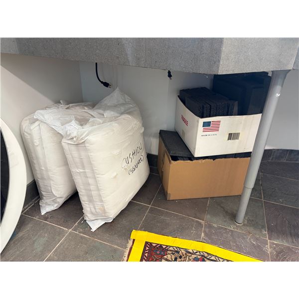 Group Of Wrapped Square Cushions And Boxes Of Foam Padding Blocks
