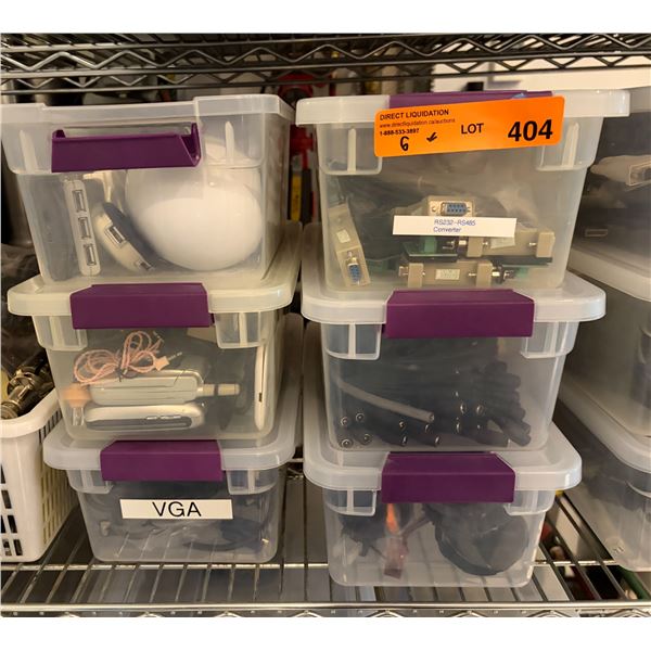 Group of Bins Containing VGA Cables, RS232-RS485 Converters, USB Hubs, and Power Adapter Tips Etc.