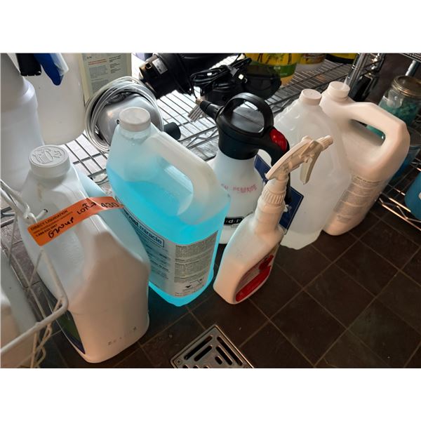 Group of Aquarium and Pond Supplies Including Laguna Koi Food, Pond Filter, and Cleaning Solutions, 