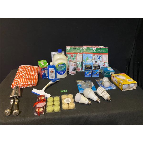 Lot of home items including light bulbs, gift bags, shoe stretchers, candles and more