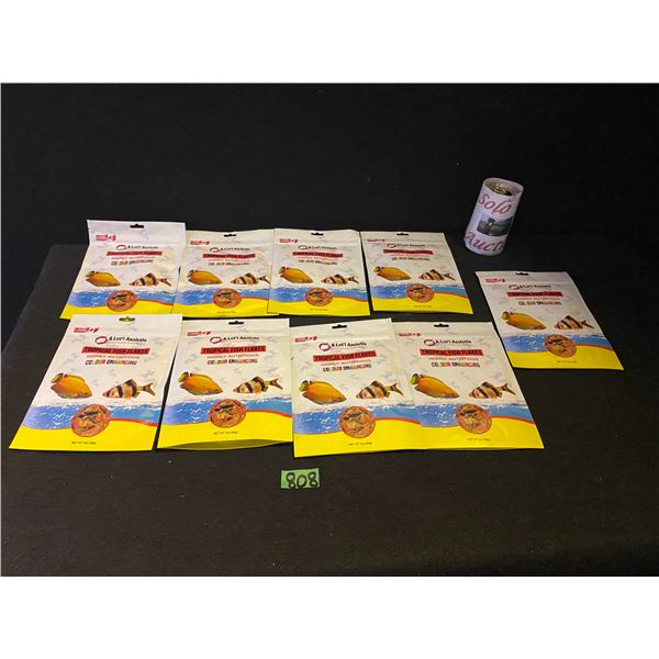 9 packages of Tropical Fish Flakes with colour enhancing - past expiry date