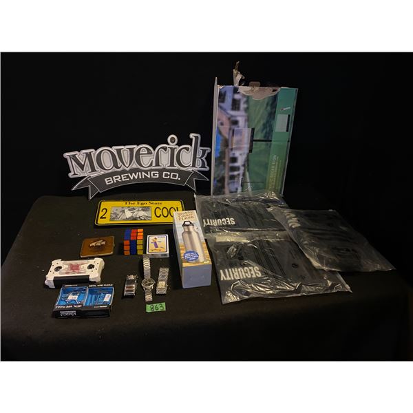 Assorted lot of items including Security t-shirts, rubics cube, puzzle games, fashion watches and mo