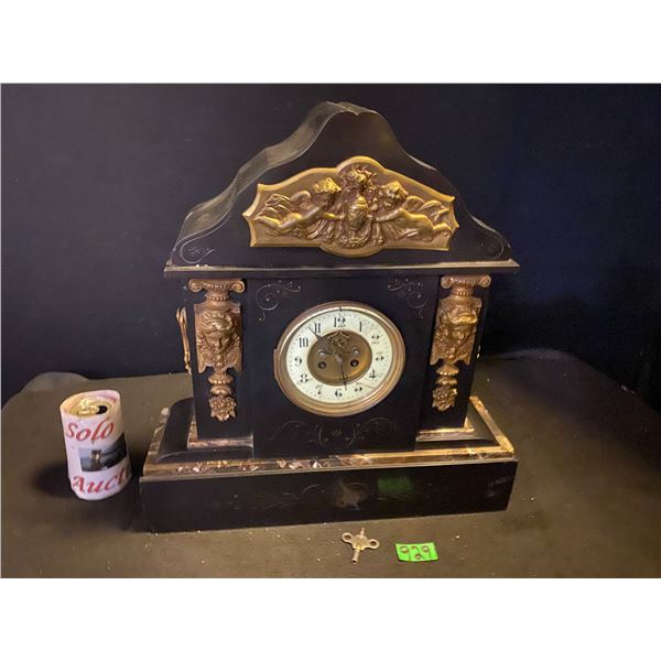Victorian era mantle clock (some damage on side)