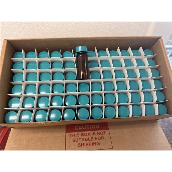 Multiple Small Glass Sample Bottles