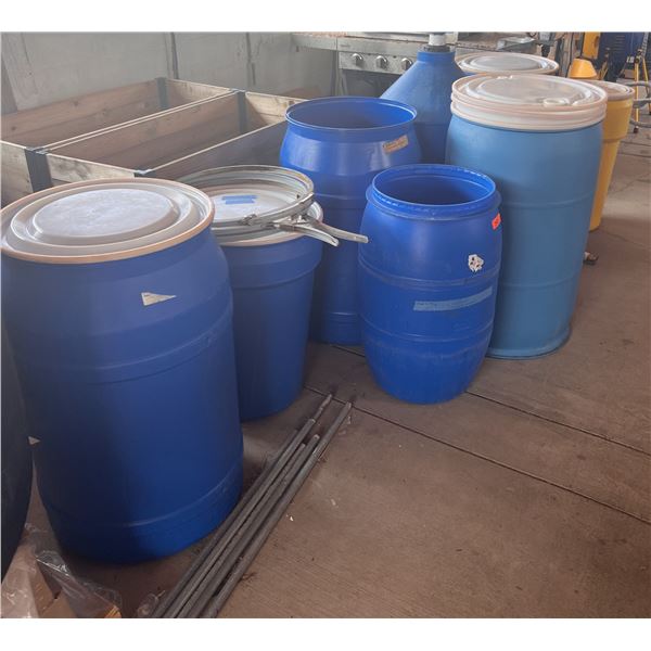 Multiple Blue Plastic Drums