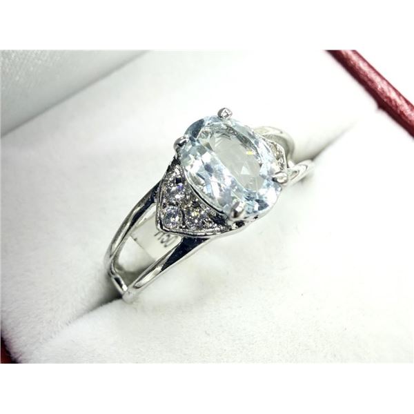 Sterling Silver Natural Blue Topaz Ring, Size 7, Retail $450.00.