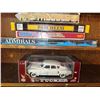 Image 1 : Board Game Lot and 1:18 Scale 1948 Tucker Diecast Model