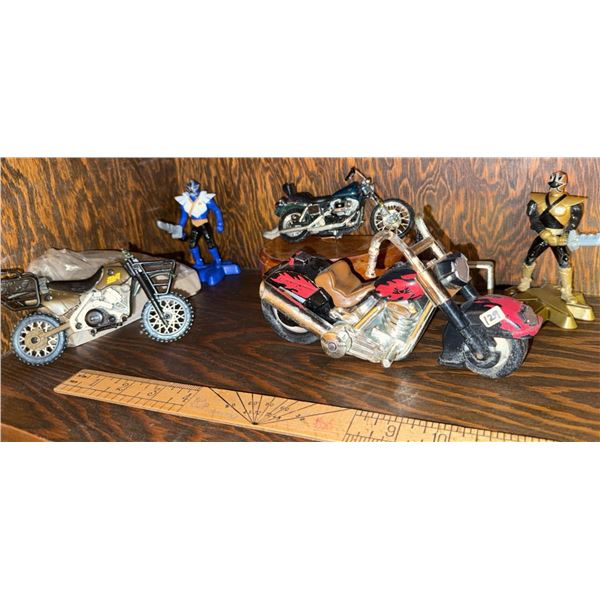 Toy Motorcycles, Action Figures, and Wooden Block
