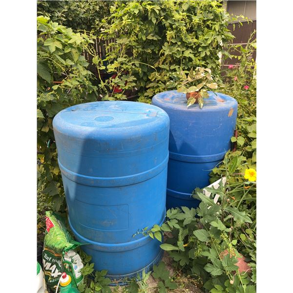 Garden Lot With Plastic Lawn Boy Statue, Blue Barrels, Lawn Care Products