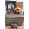 Image 1 : Lot: Framed Train Plate, Faux Flowers, Leather Storage Ottoman, Carved Elephant