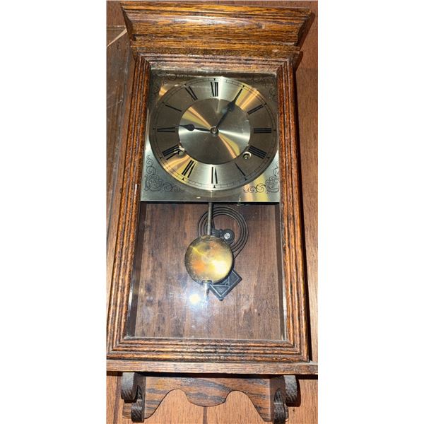 Wood Case Wall Clock with Brass Pendulum and Roman Numeral Dial