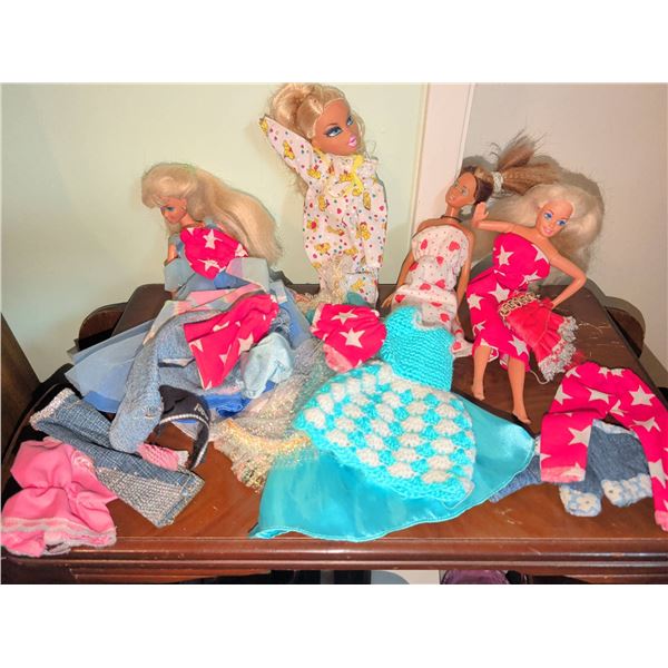 4 Dolls with Assorted Clothing and Accessories