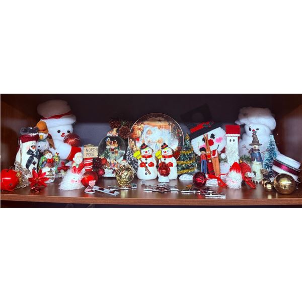 Christmas Decorations Including Snowmen, Santas, and Ornaments