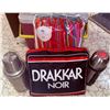 Image 2 : Outdoor Lot with Oscar and Coleman Coolers, Drakkar Noir Bag, Thermoses, Towels, and Water Balloons