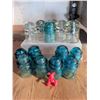 Image 2 : 11 Hemingray Glass Insulators with Red Figurine