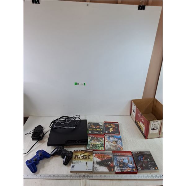 PS3, with Controller Charger Both Power On, (2) Controllers, (7) Games Uncharted Killzone God of War