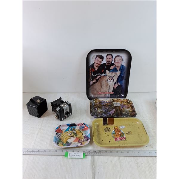 (4) Cigarette Rolling trays, (1) Brownie Hawkeye Camera